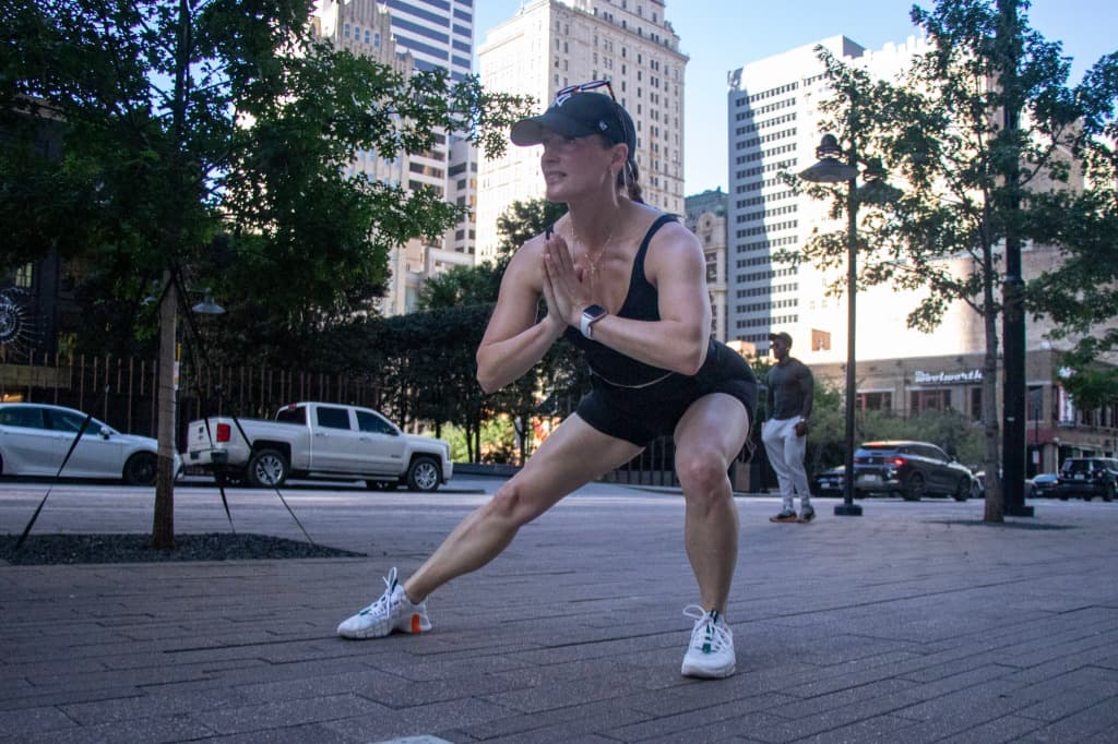 Woman stretching on the street