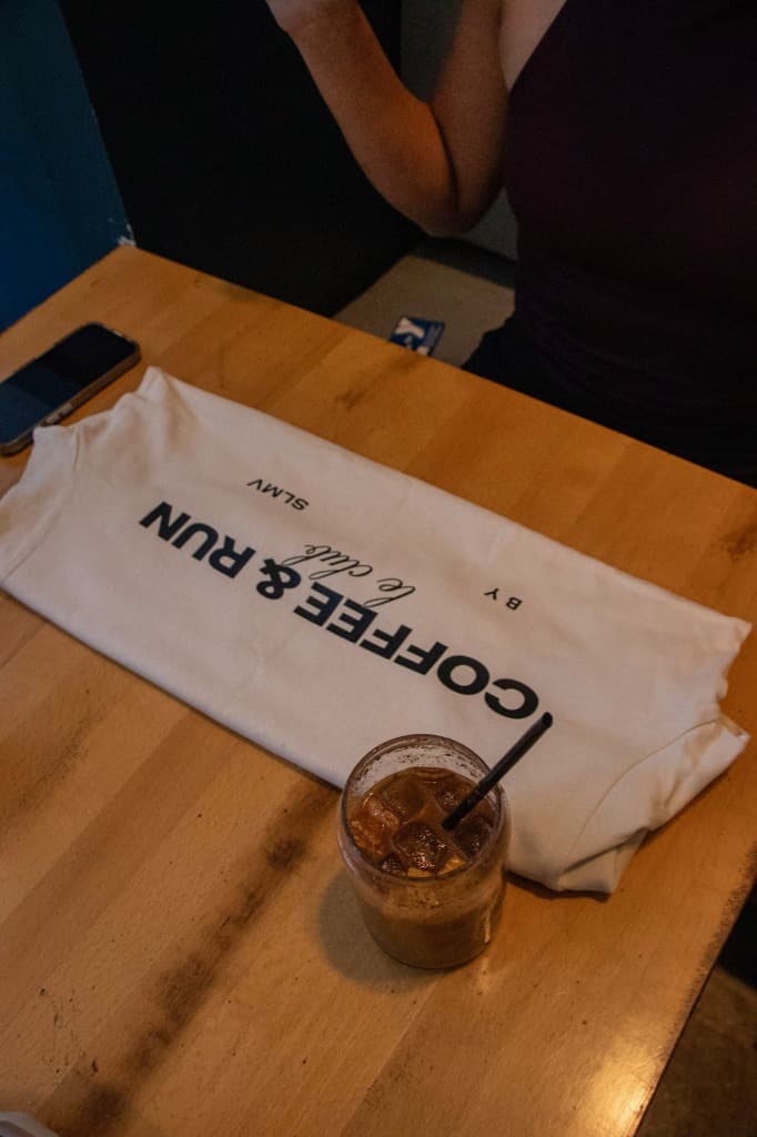 T-shirt and iced coffee on a table